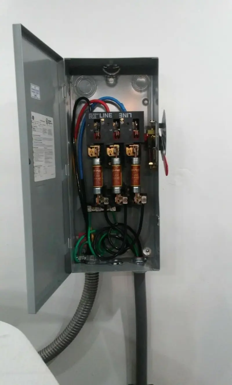Three-phase disconnect switch installed for Smoke Detector Installation in Clive