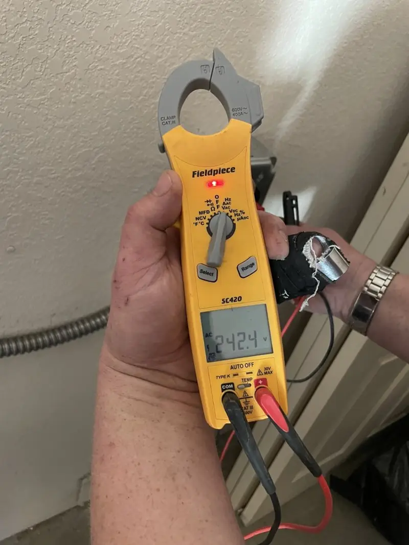 Voltage testing with clamp meter during Aluminum Wiring Replacement in Clive